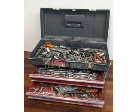 A collection of mostly spanners and sockets housed in a tool chest with three compartmentsLocation:If there is no condition r