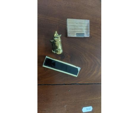 A mixed lot to include a Dupont Linea lighter and one other, together with a vesta case, fashioned as a pigLocation: cabIf th