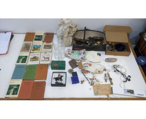 A mixed lot to include various clock parts, a collection of stamps, a boxed Tissot watch, a collection of Observers Books and