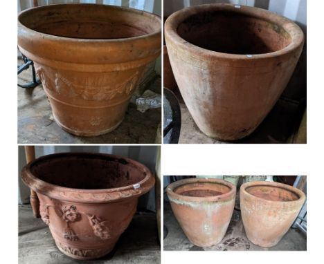 Five terracotta garden planters to include a large planter of tapering form with cast floral swags, 63h x 81wLocation: RCon I