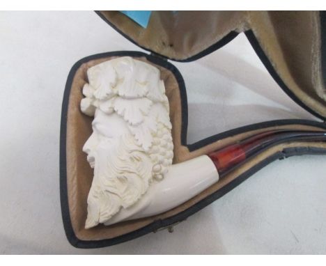 A cased Meerschaum pipe of Bacchus