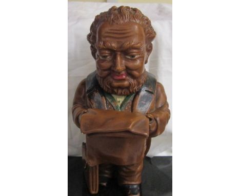 A 19th century figural tobacco jar and cover