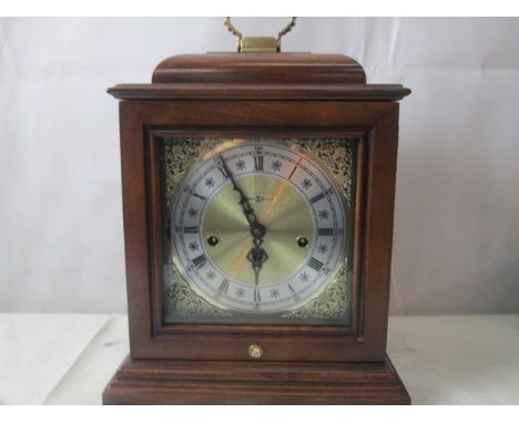 A mahogany cased mantel clock