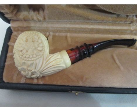 A cased Meerschaum pipe of an Eagle and Floral carving