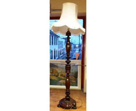 A Good Mahogany Standard Lamp & Shade, turned column, platform base on three pad feet.