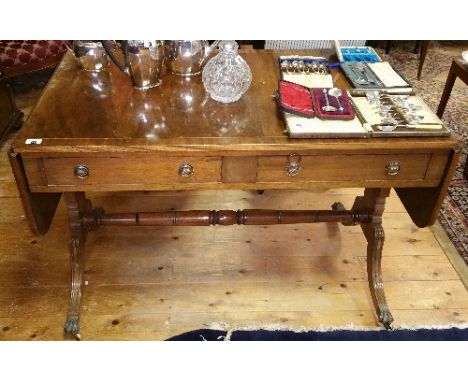 A Regency Style Mahogany Sofa Table.