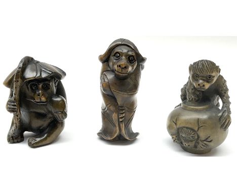 Three netsuke, modelled as monkeys 