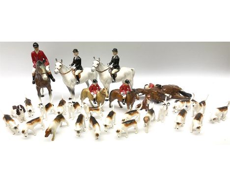 Beswick Hunting Group, comprising: two huntswoman on grey horses, model no 1730, huntsman on a bay horse, model no 1501, a se