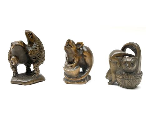 Three netsuke, modelled as a rat, kittens in a basket and a pair of frogs