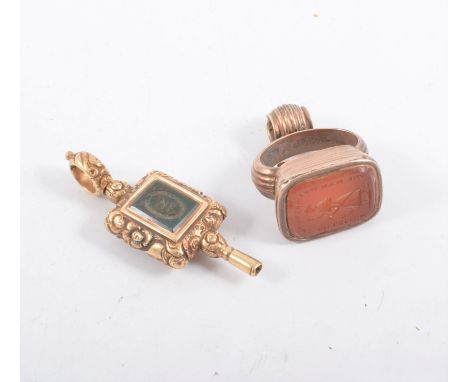 19th Century watch fob intaglio carved cornelion of a coachman and the motto "The man wot drove the Sovereign" and a yellow m