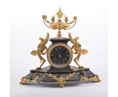 A French Empire style marble and ormulu mantel clock, late 19th century, signed Mercery & Co, Rue du Parc Royal, circular bla