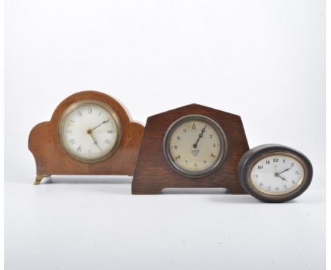 Edwardian inlaid mantel clock, oak clock, and one other.(3)
