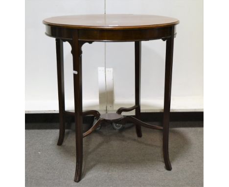 Edwardian mahogany window table, circular top with rosewood cross-banding, plain frieze, moulded splayed legs joined by a she