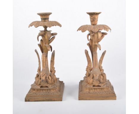 Two cast and gilt metal lamp bases, each designed as a swan, approximately 29cm; together with six brass curtain tie-backs.