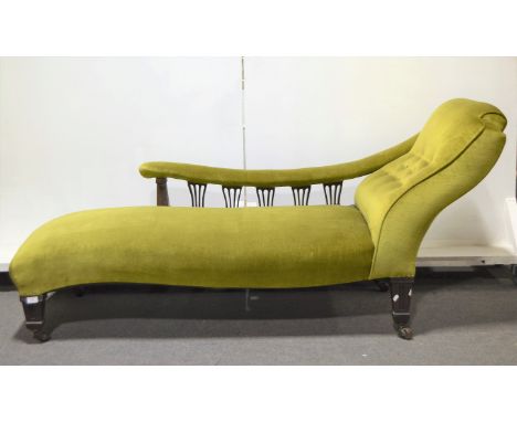 Edwardian walnut chaise longue, square tapering fluted supports, button dralon upholstery, on casters, length 188cm.