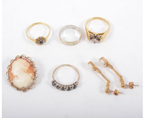 A collection of jewellery - two sapphire and diamond cluster rings, one marked 18ct, a pair of oval cabochon cut opal earring