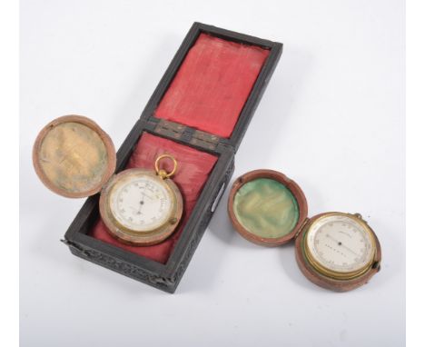 Brass cased compensated pocket barometer, by Negretti & Zambra, together with carved hardwood box and another, (2).
