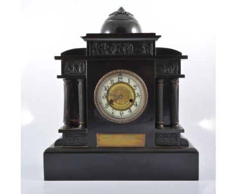 Victorian black slate mantel clock, architectural pediment, with a classical frieze, circular dial, plinth base, the movement