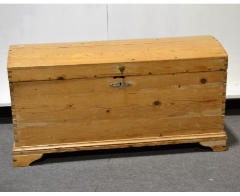 Dutch pine coffer, domed top, bracket feet, length 101cm, depth 49cm, height 53cm.