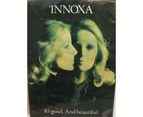 A VINTAGE METAL ON CARDBOARD ADVERTISING SIGN FOR INNOXA, approx. 34 x 25.5 cm