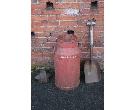 A VINTAGE LNER 'WARE' MILK CHURN A/F, together with a fireman's shovel and a Victorian cast iron carriage air vent (3)