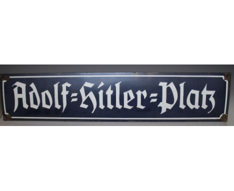 A VINTAGE GERMAN ENAMEL STREET / ROAD SIGN FOR 'ADOLF HITLER PLATZ', blue ground with white lettering, approximate dimensions