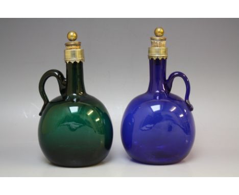 A VICTORIAN BRISTOL BLUE GLASS FLASK, with applied clear glass loop handle, having silver plated mounts and cork stopper, tog