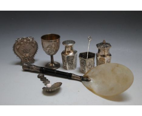 A COLLECTION OF CHINESE SILVER AND WHITE METAL CONSISTING OF A DRAGON EGG CUP, a hexagonal three piece cruet set, a double de