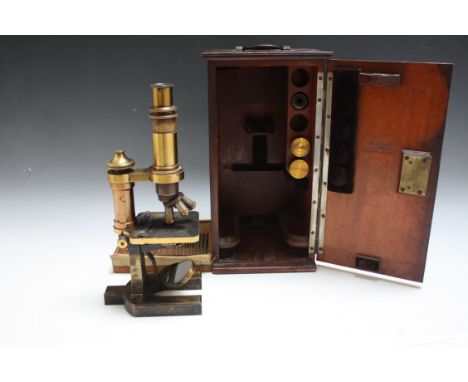 A VINTAGE CASED C. ZEISS JENA BRASS MICROSCOPE, with markings as titled and numbered 10769, together with a small selection o