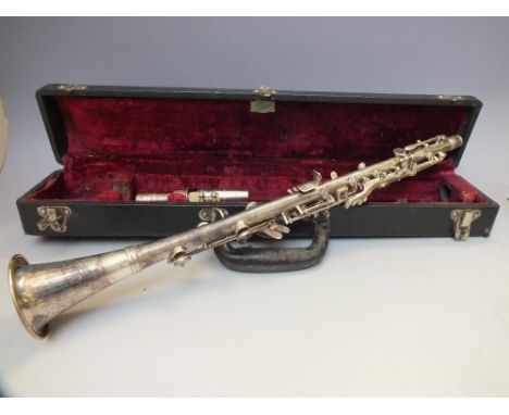 A VINTAGE CASED HOLTON WHITE METAL CLARINET, with engraved markings 'Holton 321 Elkhorn WIS, circa. 1947, serial no. 181447