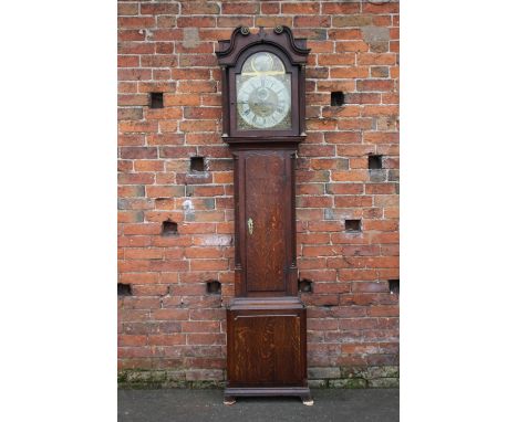 A 19TH CENTURY OAK CASED EIGHT DAY LONGCASE CLOCK WITH BRASS DIAL, the arched dial with subsidiary seconds dial and date aper