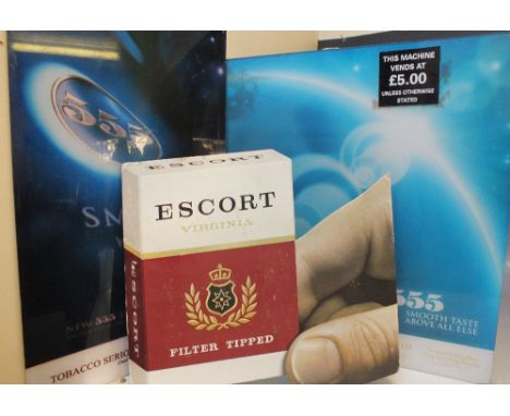 A VINTAGE CARDBOARD ADVERTISING SIGN FOR ESCORT VIRGINIA  CIGARETTES, approx 37 x 33 cm, together with two later plastic adve