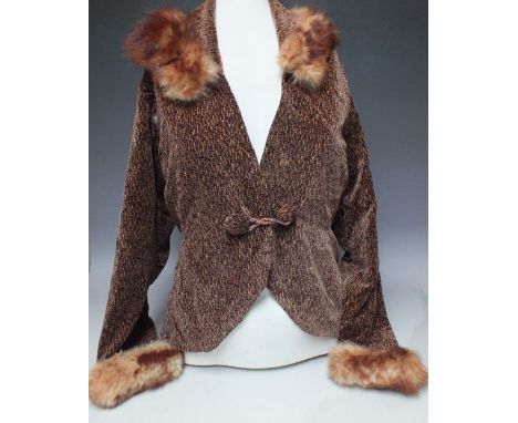 A COLLECTION OF VINTAGE CLOTHING ITEMS, comprising two jackets, a vintage feather cape and a small selection of fur accessori