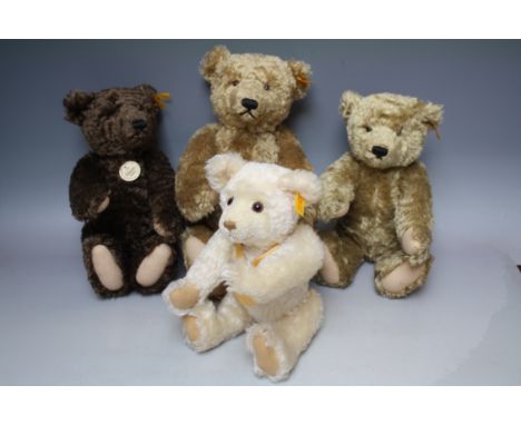 A COLLECTION OF FOUR CLASSIC STEIFF BEARS, comprising a chocolate bear with growler EAN: 00836,  a blond bear with growler EA