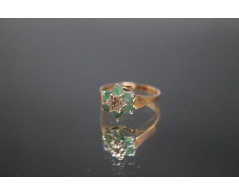 A HALLMARKED 9 CARAT GOLD EMERALD AND DIAMOND RING, ring size P 1/2