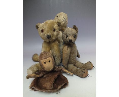 A COLLECTION OF FOUR VINTAGE TEDDY BEARS ETC., to include a late 19th / early 20th century miniature straw filled mohair bear