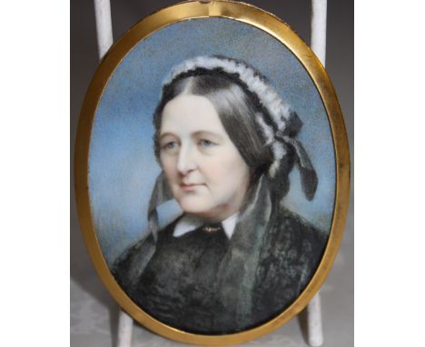 A 19TH CENTURY OVAL PORTRAIT MINIATURE ON IVORY, study of a woman in a black dress and bonnet, unsigned, framed, 8 x 6 cm