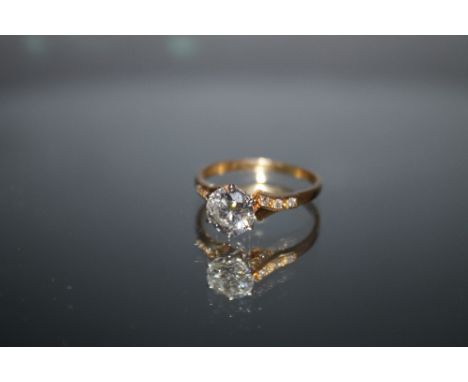 A NEAR COLOURLESS BRILLIANT CUT DIAMOND SOLITAIRE IN HALLMARKED 18 CARAT GOLD, the brilliant cut diamond comes with an indepe