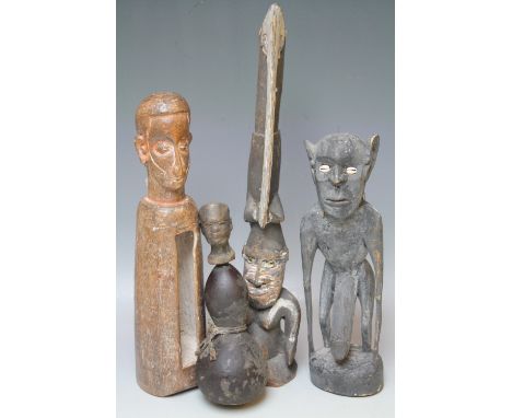 A COLLECTION OF FOUR CARVED HARDWOOD TRIBAL FIGURES, tallest H 46 cm (4)