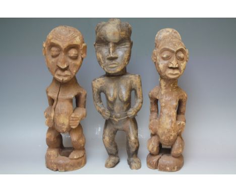 A COLLECTION OF THREE CARVED HARDWOOD TRIBAL FIGURES, average H 40 cm (3)