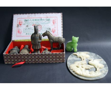 Boxed terracotta warriors and jade-type cat, plus an oval soapstone storks plaque CONDITION REPORT; Terracotta figures are pu