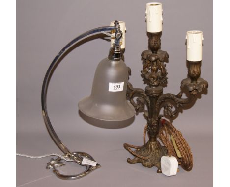 A chrome desk light with a frosted glass 'bell' shade, together with a three sconce electric table light in the form of a can