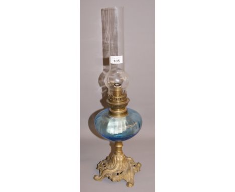 A 19th Century brass oil lamp, with a blue-glass reservoir (no shade) CONDITION REPORT; Approximately 52 cm tall 