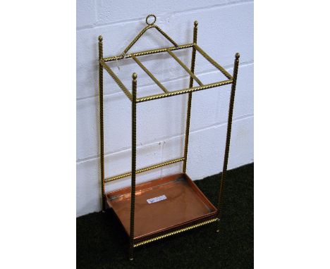 A brass sectioned umbrella and stick stand with a polished copper drip-tray CONDITION REPORT; Approximately 72 cm high x 33 c