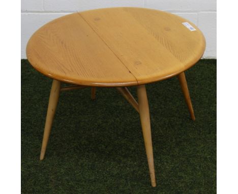 An Ercol elm circular occasional table with single-side drop-leaf  CONDITION REPORT; Approximately 40 cm high x 62 cm deep