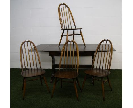 Ercol dark elm dining table and four chairs CONDITION REPORT; Length approximately 115 cm x 71 cm width 74 cm high 