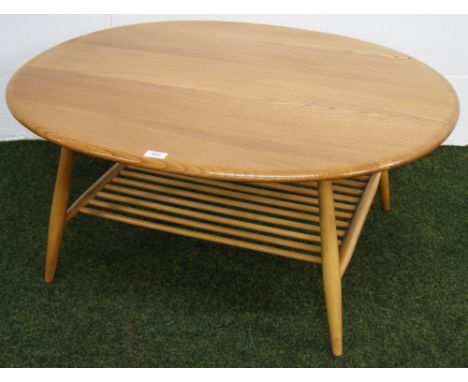 An Ercol elm oval occasional table (no label) CONDITION REPORT; 82 cm width x 100 cm length x 44 cm height approximately 