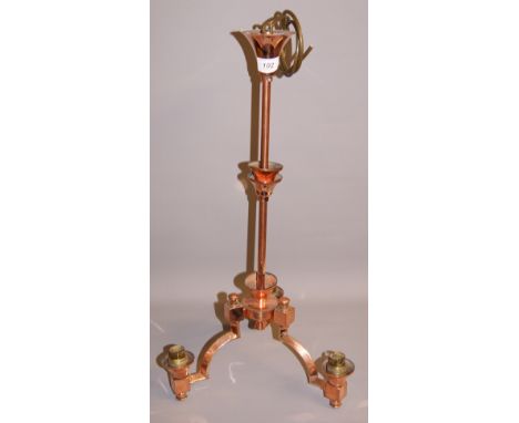 An Arts and Crafts suite of electric lighting in copper, comprising a three-sconce ceiling light and a pair of two-light wall