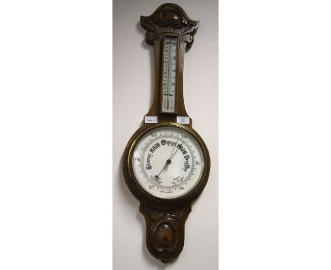 Oak cased aneroid barometer with a fixed thermometer  CONDITION REPORT; Approximately 80 cm long