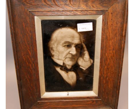 An oak framed ceramic tile, signed T O' Hara.  (1908 Sherman & Cotton)  CONDITION REPORT; Frame is approximately 36 cm x 28 c